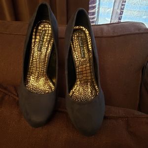 Black faux suede pumps